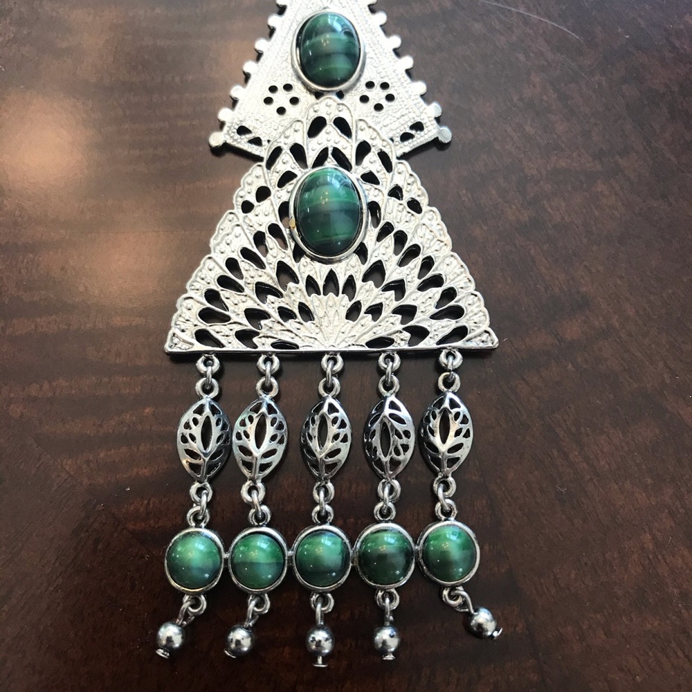 Long silver tone necklace with Green Stones
